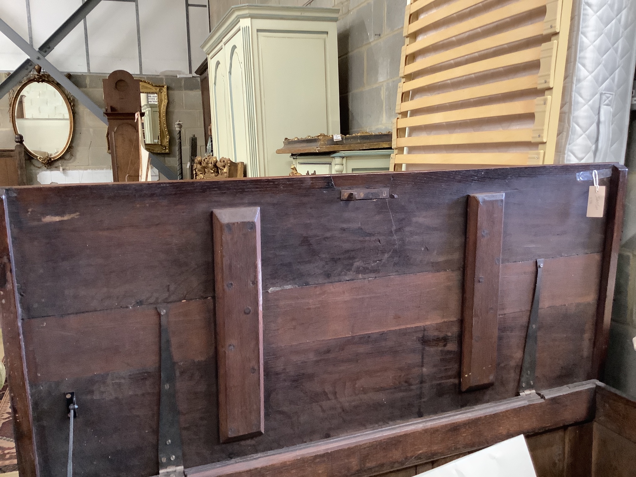 An 18th century marquetry inlaid oak coffer, width 130cm, depth 56cm, height 68cm